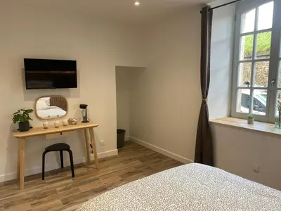 Un ou plusieurs lits dans un hébergement de l'établissement Gite 2 du grand Pavillon