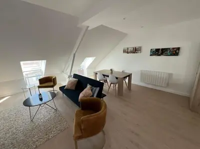 Coin salon dans l'établissement Appartement neuf proche gare