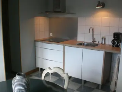 Cuisine ou kitchenette dans l'établissement La Roseraie, campagne, calme et paix