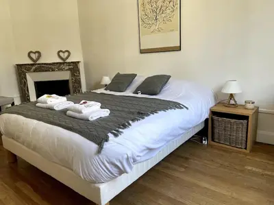 Un ou plusieurs lits dans un hébergement de l'établissement Clou dans le fer hyper centre immeuble luxueux
