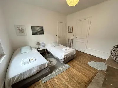 Un ou plusieurs lits dans un hébergement de l'établissement Clou dans le fer hyper centre immeuble luxueux