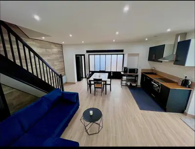Cuisine ou kitchenette dans l'établissement La Maison du faubourg & Spa