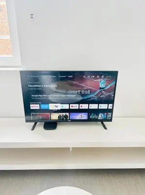 Télévision ou salle de divertissement dans l'établissement Appartement Lumineux & Confortable