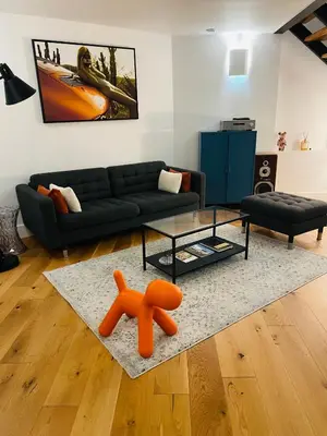 Coin salon dans l'établissement Loft Reims - Parking gratuit