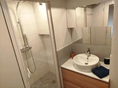 Salle de bains dans l'établissement Le Coq Bleu