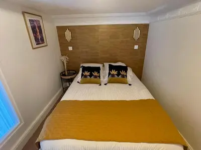 Un ou plusieurs lits dans un hébergement de l'établissement Appartement de charme Art Déco - Hyper-centre ville - Place d'Erlon - Gare - Reims