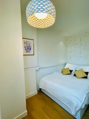 Un ou plusieurs lits dans un hébergement de l'établissement Appartements de charme du Général Leclerc - Place d'Erlon - Hypercentre - Gare - Reims