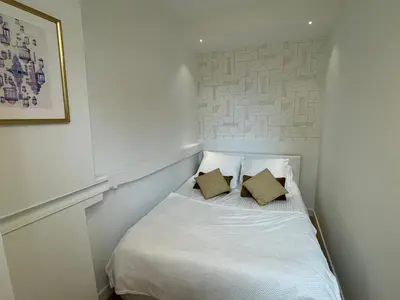 Un ou plusieurs lits dans un hébergement de l'établissement Appartements de charme du Général Leclerc - Place d'Erlon - Hypercentre - Gare - Reims