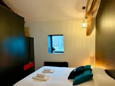 Un ou plusieurs lits dans un hébergement de l'établissement Au Coin de Saint-Jacques Reims hypercentre