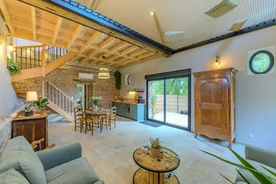 Coin salon dans l'établissement La Bergerie des 2 Tilleuls - Maison avec jacuzzi