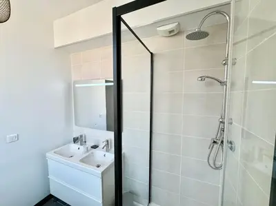 Salle de bains dans l'établissement Les Palmettes Hypercentre Reims
