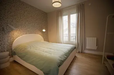 Un ou plusieurs lits dans un hébergement de l'établissement Soft Wood - Duplex - Historique