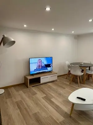 Télévision ou salle de divertissement dans l'établissement le Gite des lavandières