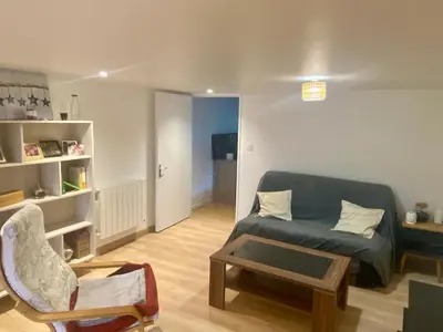Coin salon dans l'établissement Le carolo