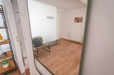 Coin salon dans l'établissement Jeroboam Fauvette, bel appartement hyper centre Epernay