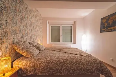 Un ou plusieurs lits dans un hébergement de l'établissement Jeroboam Fauvette, bel appartement hyper centre Epernay