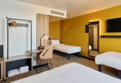Un ou plusieurs lits dans un hébergement de l'établissement B&B HOTEL Meaux Nanteuil-lès-Meaux 3 étoiles