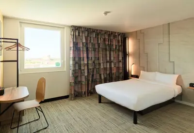 Un ou plusieurs lits dans un hébergement de l'établissement B&B HOTEL Meaux Nanteuil-lès-Meaux 3 étoiles
