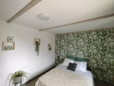 Un ou plusieurs lits dans un hébergement de l'établissement Chambre à la Campagne
