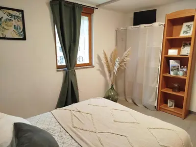 Un ou plusieurs lits dans un hébergement de l'établissement Chambre à la Campagne