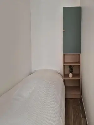 Un ou plusieurs lits dans un hébergement de l'établissement Ticya Lodge - Maison calme, neuve, proche de Disneyland Paris, parking privé