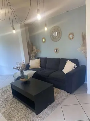 Coin salon dans l'établissement T2 Compiegne