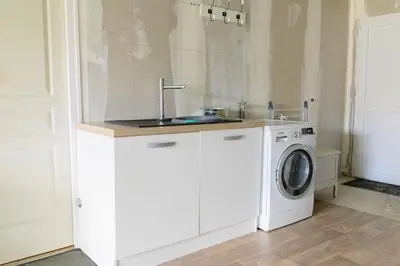 Cuisine ou kitchenette dans l'établissement Maison plain pied