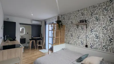 Un ou plusieurs lits dans un hébergement de l'établissement Jupiter Tiny House