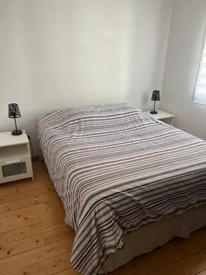 Un ou plusieurs lits dans un hébergement de l'établissement Maison dans le vignoble à proximité de Reims