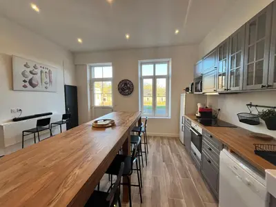 Cuisine ou kitchenette dans l'établissement Le Gîte des Ecuries SPA, Domaine de Foreste