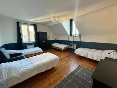Un ou plusieurs lits dans un hébergement de l'établissement Le Gîte des Ecuries SPA, Domaine de Foreste