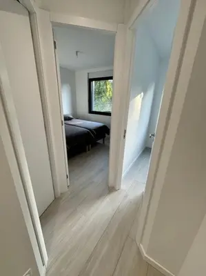 Un ou plusieurs lits dans un hébergement de l'établissement Appartement meublé de 120 m2