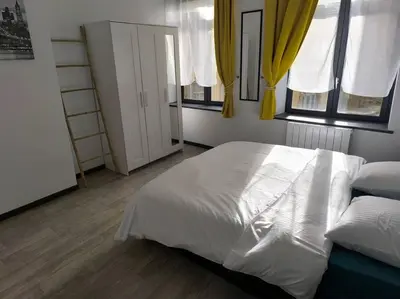 Un ou plusieurs lits dans un hébergement de l'établissement Rivage Ardennais - chateau - CHU -T2-queen size