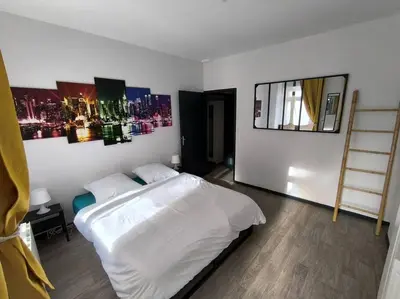 Un ou plusieurs lits dans un hébergement de l'établissement Rivage Ardennais - chateau - CHU -T2-queen size