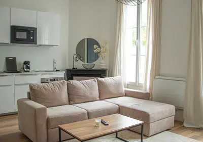Cuisine ou kitchenette dans l'établissement Appartement Cozy - Proximité Maisons de Champagne - Wifi