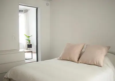 Un ou plusieurs lits dans un hébergement de l'établissement Appartement Cozy - Proximité Maisons de Champagne - Wifi