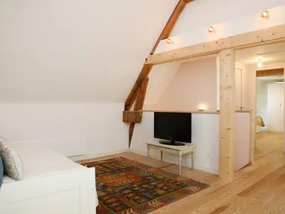 Télévision ou salle de divertissement dans l'établissement Le Jardin d'Aimee by La boite en Plus