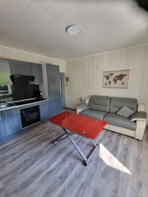 Cuisine ou kitchenette dans l'établissement Studio Meublé Quai 1 Voie B parking gratuit