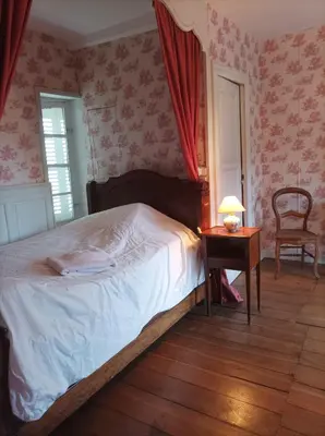 Un ou plusieurs lits dans un hébergement de l'établissement Château d'Hugémont- aile du Parc