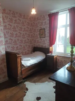 Un ou plusieurs lits dans un hébergement de l'établissement Château d'Hugémont- aile du Parc