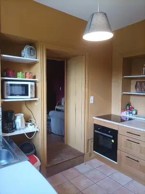 Cuisine ou kitchenette dans l'établissement Château d'Hugémont- aile du Parc