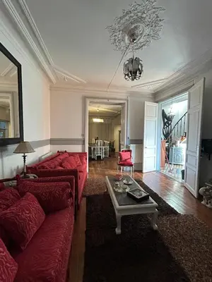 Coin salon dans l'établissement Maison Charmante