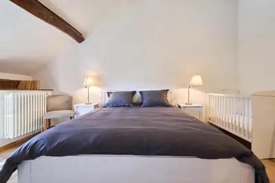 Un ou plusieurs lits dans un hébergement de l'établissement Gîte 6 chambres entre Reims et Epernay - Le Tilleul - Gîtes Au Beau Sarrazin