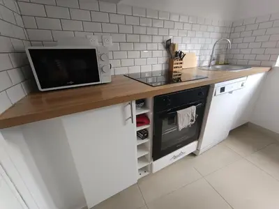 Cuisine ou kitchenette dans l'établissement Appartement Emeraude 2 pers - L'Artdu'Net -