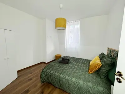Un ou plusieurs lits dans un hébergement de l'établissement Nest in Heart of Épernay