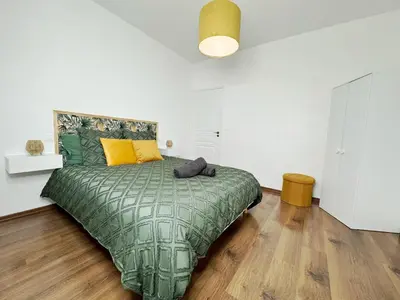 Un ou plusieurs lits dans un hébergement de l'établissement Nest in Heart of Épernay