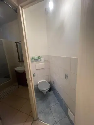 Salle de bains dans l'établissement T1 Proche centre et cité Tirlet