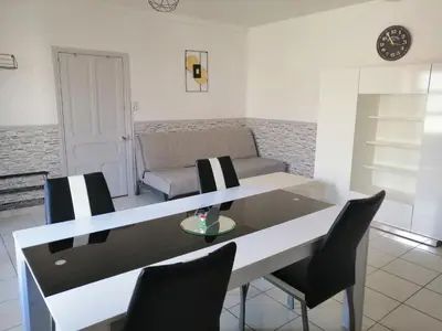 Coin salon dans l'établissement Appartement 29 B - Mailly-le-camp