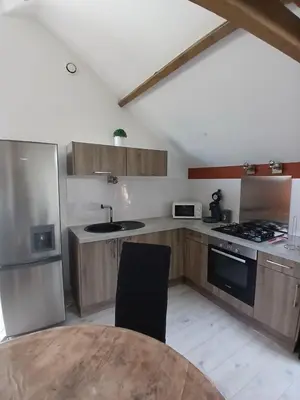 Cuisine ou kitchenette dans l'établissement Le gîte du Château d'eau - Larouillies