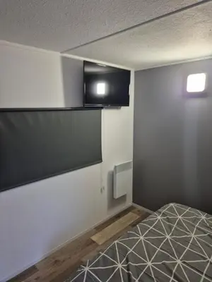 Télévision ou salle de divertissement dans l'établissement Mobil-Home N 48